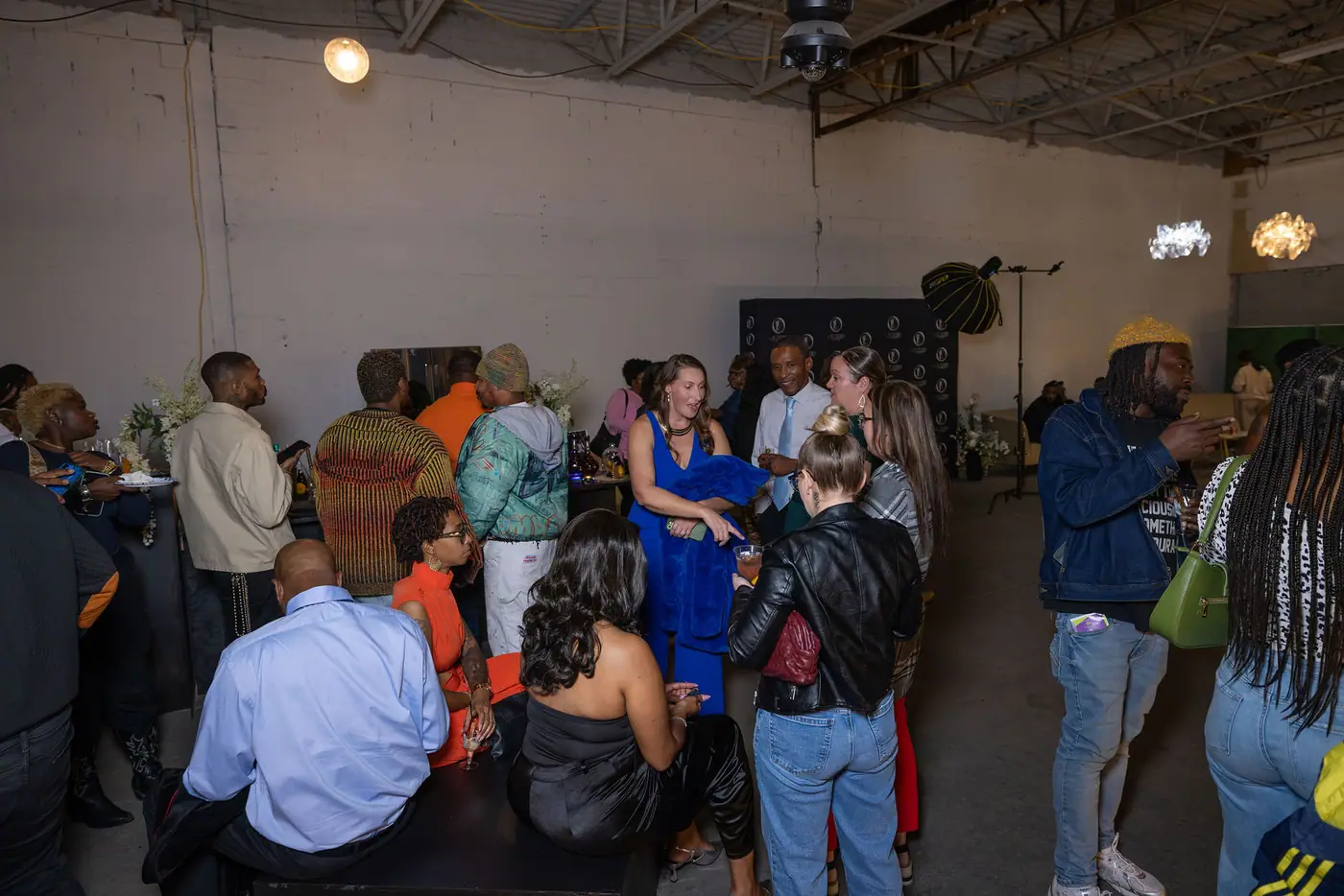 Guests filling the open floor at The Preview, October 9, 2026. Photo by Eroll Photography
